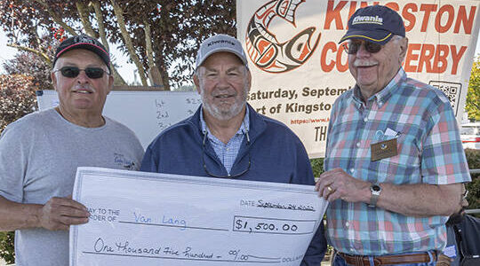 Mike Reed, center, at the Coho Derby. Kiwanis Courtesy Photo