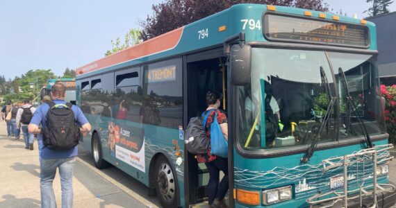 Passengers deboarding the Port Orchard Foot Ferry make their way onto nearby Kitsap Transit buses. Elisha Meyer/Kitsap News Group