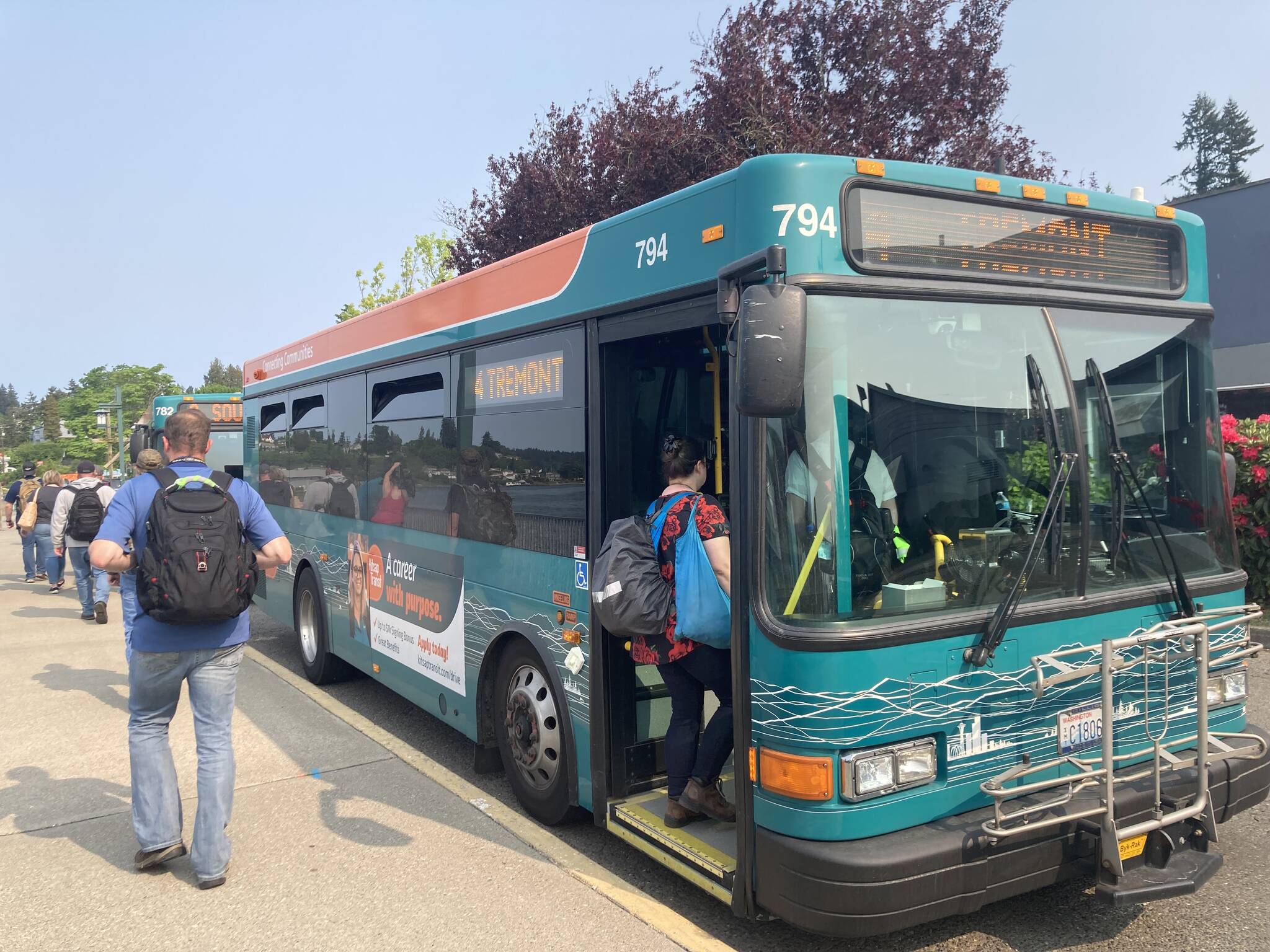 Passengers deboarding the Port Orchard Foot Ferry make their way onto nearby Kitsap Transit buses. Elisha Meyer/Kitsap News Group