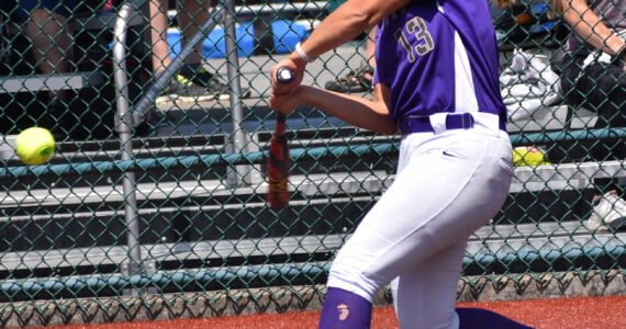 Cerenity Fake hits the final home run to NK’s perfect season. Nicholas Zeller-Singh/Kitsap News Group Photos