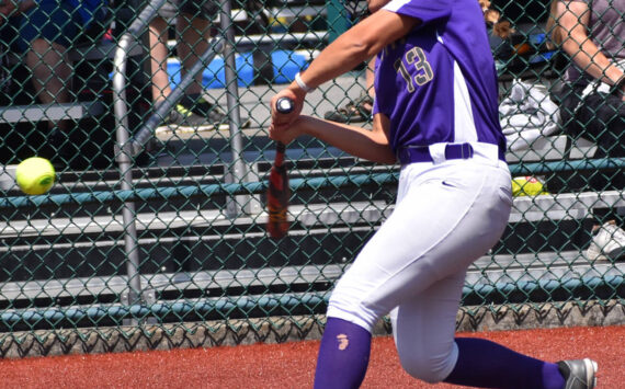 Cerenity Fake hits the final home run to NK’s perfect season. Nicholas Zeller-Singh/Kitsap News Group Photos