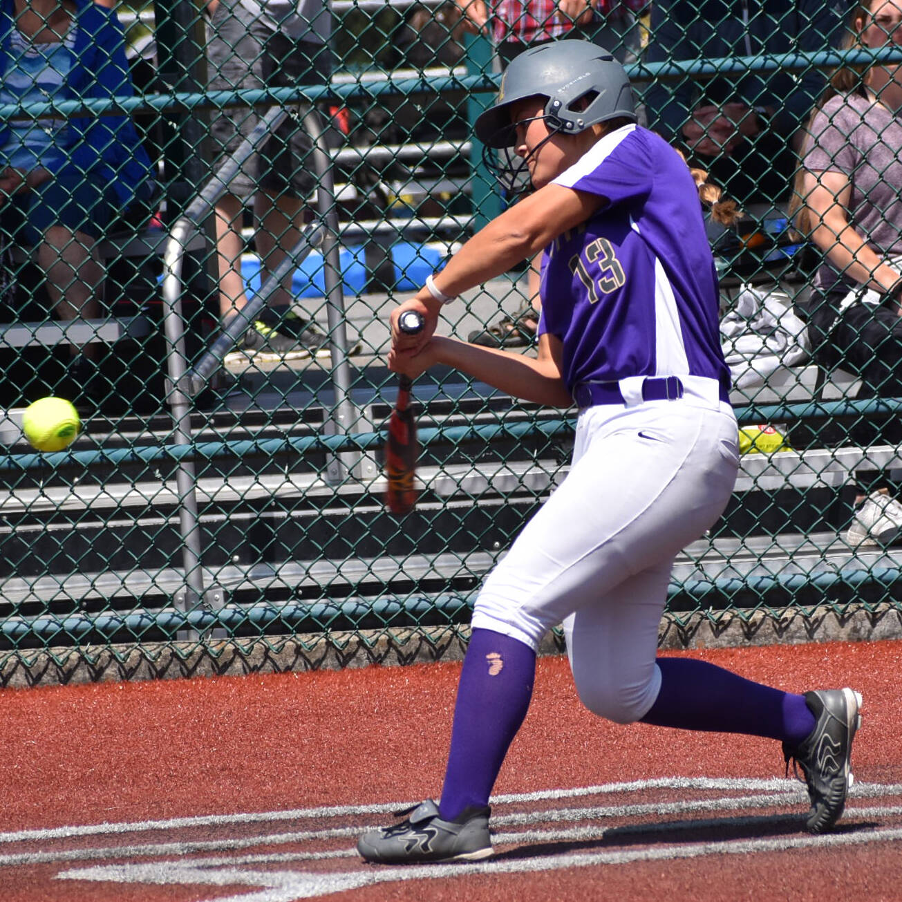 Cerenity Fake hits the final home run to NK’s perfect season. Nicholas Zeller-Singh/Kitsap News Group Photos