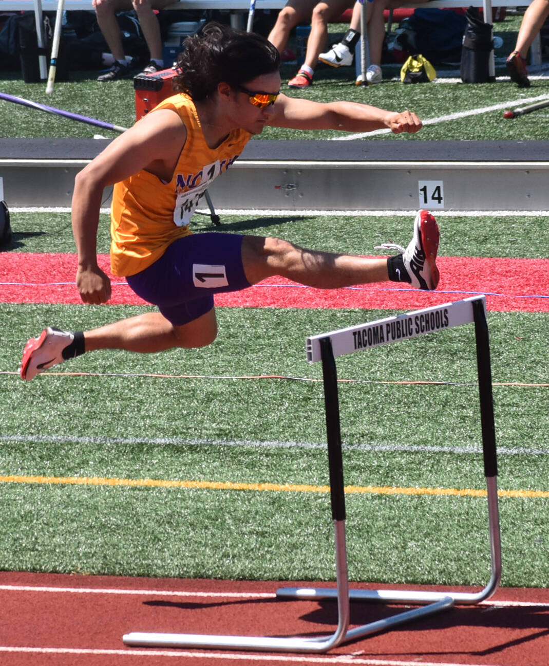 North Kitsap’s Tenichi Gordon competes in the hurdles and pole vault at state.