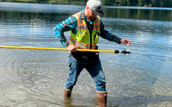 Kitsap County courtesy photos 
A worker checks for fecal bacteria, toxic cyanobacteria (blue-green algae), and other hazards that can make people sick in Kitsap swimming beaches and lakes.
