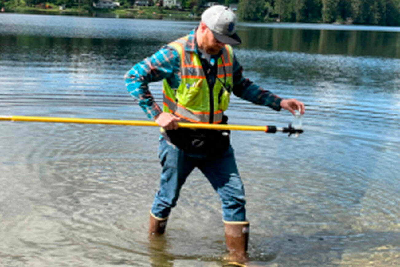Kitsap County courtesy photos 
A worker checks for fecal bacteria, toxic cyanobacteria (blue-green algae), and other hazards that can make people sick in Kitsap swimming beaches and lakes.