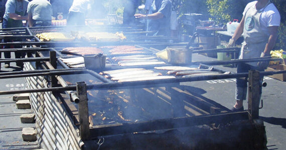 Ray Pardo courtesy photo 
Cooks get salmon ready for visitors.