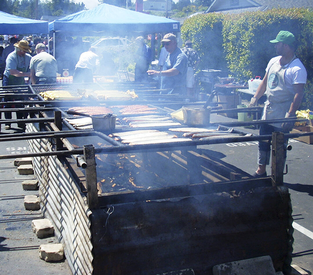 Ray Pardo courtesy photo 
Cooks get salmon ready for visitors.