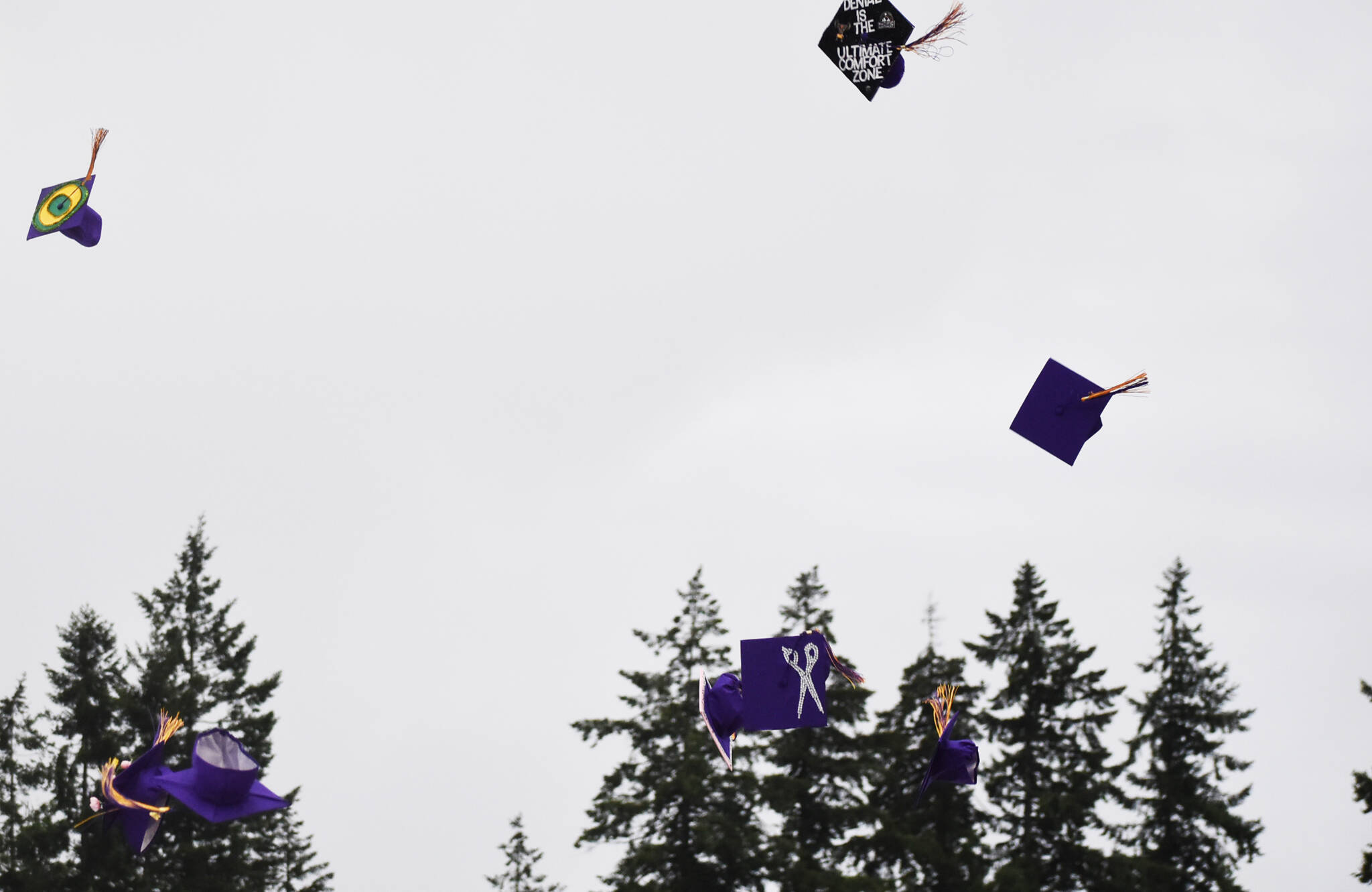 Caps were thrown in the air at the end of graduation.