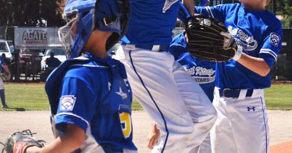 Ellis Slade celebrates with his teammates after hitting a homerun. Nicholas Zeller-Singh/Kitsap News Group Photos