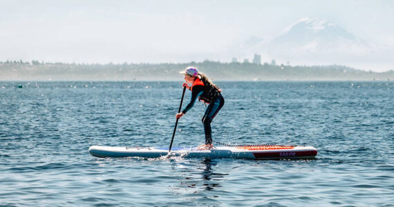 Camlyn Anderson courtesy photo
A camper paddleboards in Puget Sound off Saltair Beach in Kingston.