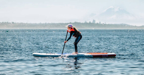 Camlyn Anderson courtesy photo
A camper paddleboards in Puget Sound off Saltair Beach in Kingston.