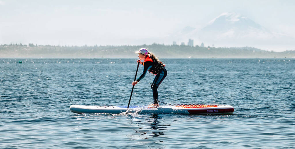 Camlyn Anderson courtesy photo
A camper paddleboards in Puget Sound off Saltair Beach in Kingston.