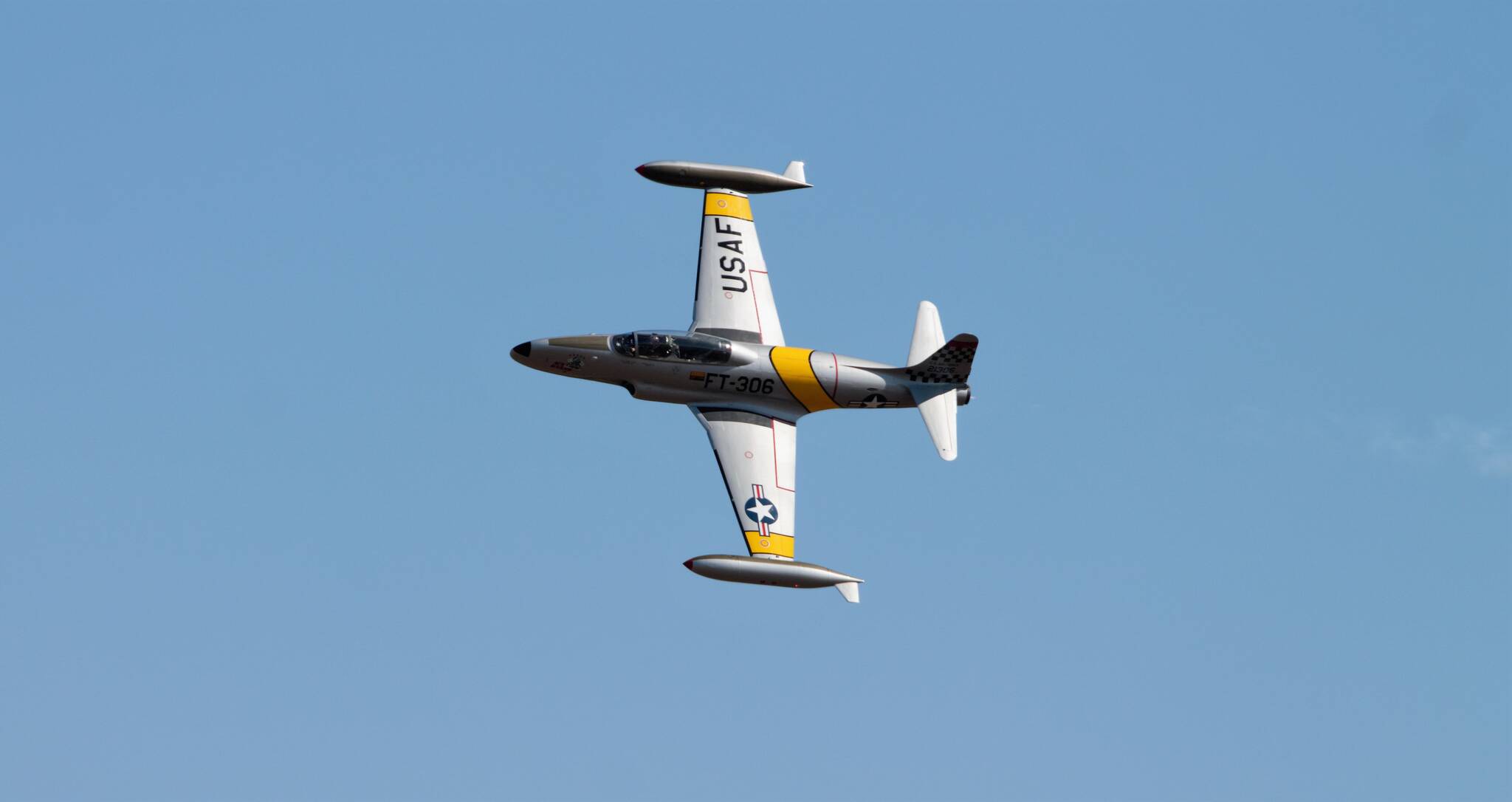 Greg Colyer soars by in a T-33 ‘Shooting Star.’