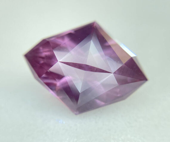 This Dragon Garnet was artfully cut by lapidary artist Kory Pettman to resemble a dragon eye! Bainbridge Island jeweller Robin Callahan is setting the stone in a custom ring for a private buyer.