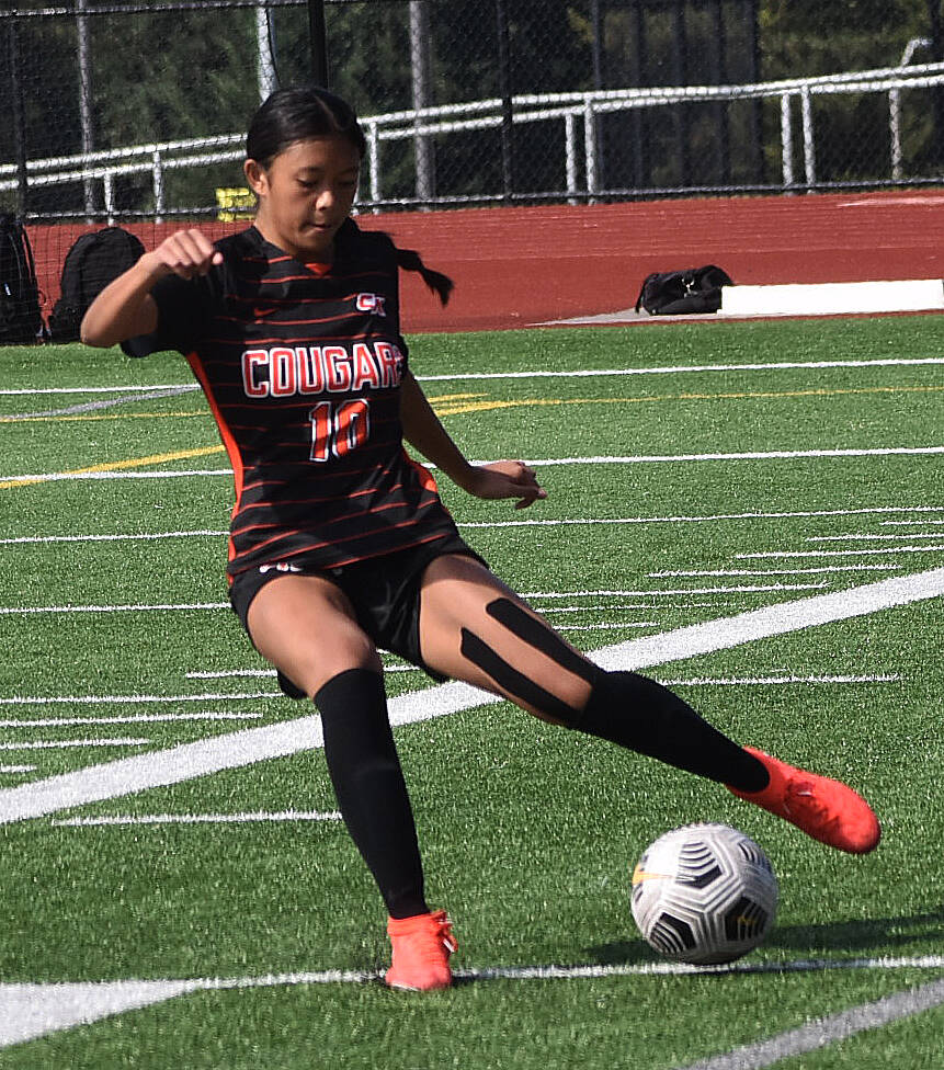 Central Kitsap’s Maleia Dayao ties the game at 1-1.
