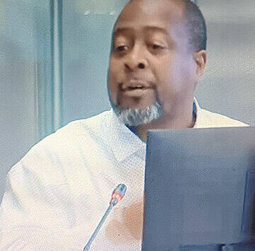 Steve Powell/Kitsap News Group
Drayton Jackson talks about the conference during the meeting.
