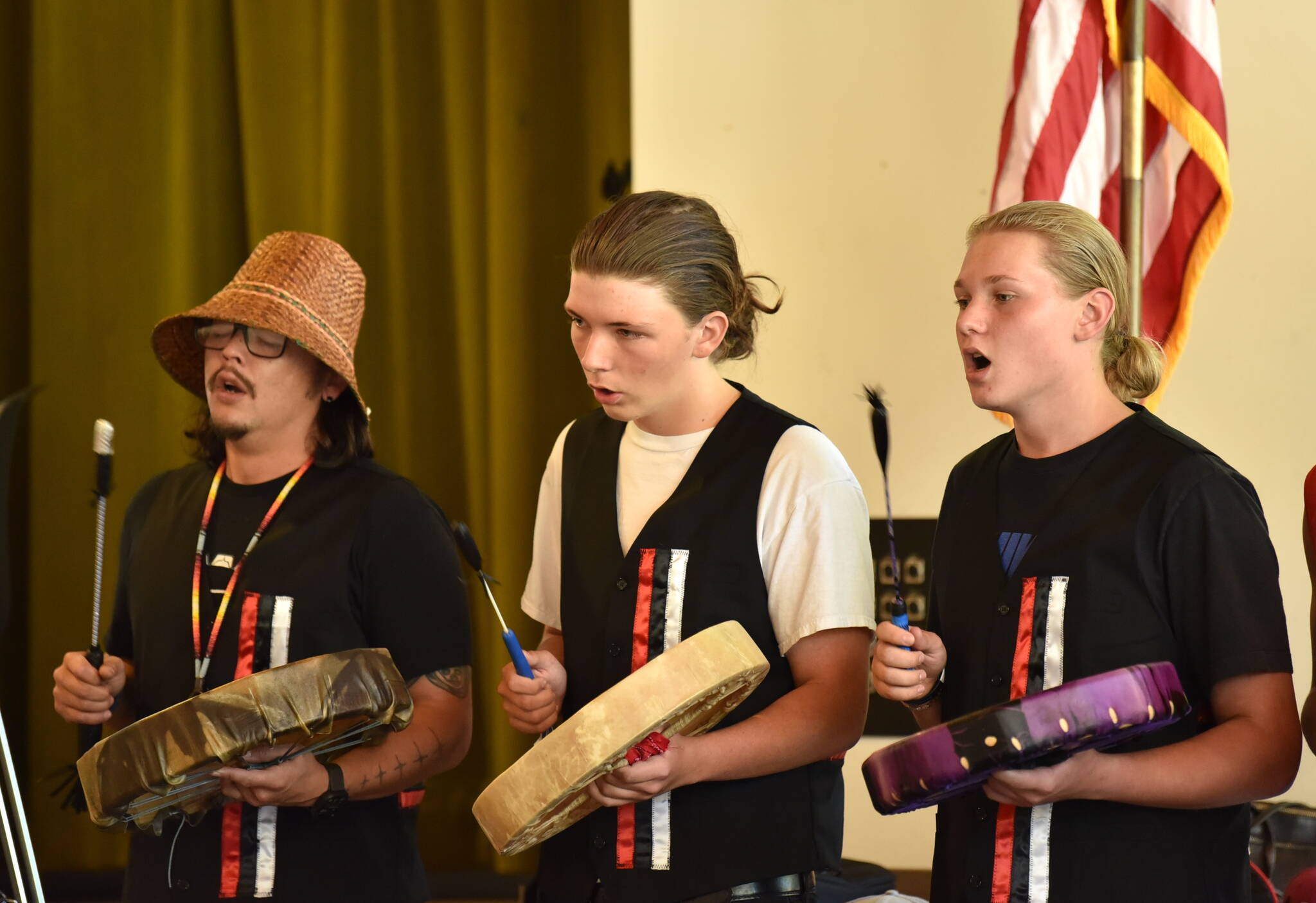 Nancy Treder/Kitsap News Group Photos
Bearon Old Coyote leads the Blessing Song with members of the dance and song group.