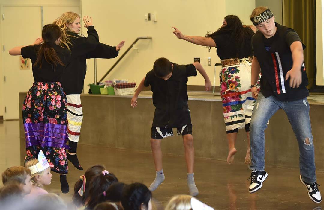 Dancers perform the Warriors Dance at the assembly.