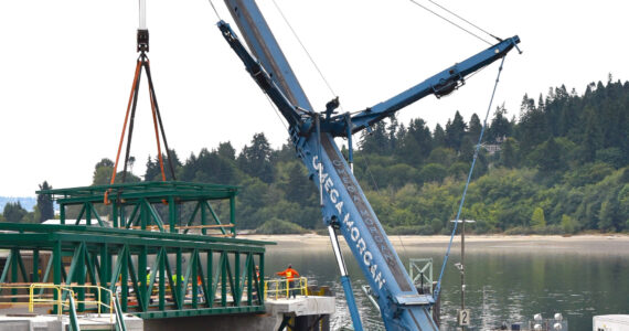 Nancy Treder/Kitsap News Group
Construction work continues at the Bainbridge Island ferry terminal where a second walkway span was set into place the morning of Sept. 11.