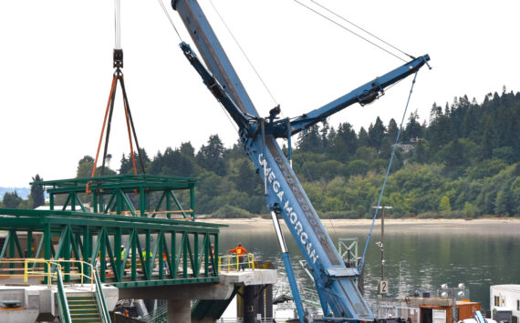 Nancy Treder/Kitsap News Group
Construction work continues at the Bainbridge Island ferry terminal where a second walkway span was set into place the morning of Sept. 11.