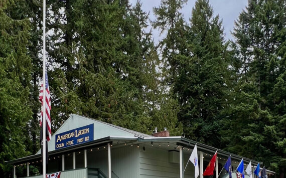 Nancy Treder/Kitsap News Group
The American Legion Colin Hyde Post 172 on Bainbridge Island flew the American flag at half-staff to commemorate Patriot Day in honor of the first responders and civilians who died or were wounded on Sept. 11, 2001, and the POW/MIA flag for military personnel who were prisoners of war or missing in action.