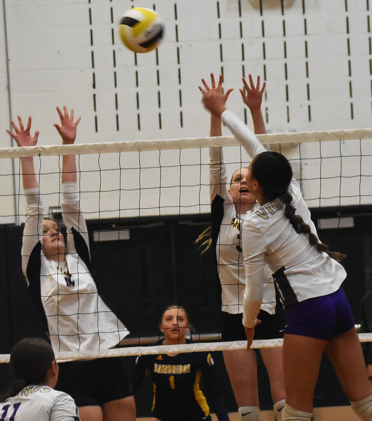 Nicholas Zeller-Singh/Kitsap News Group Photos
North Kitsap’s Silvia Okunami picks up a kill for the Vikings.