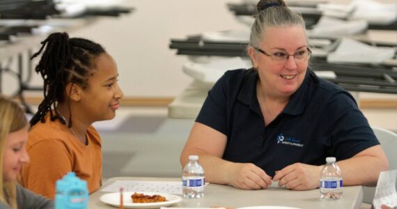 Elisha Meyer/Kitsap News Group
Kimberly Adams (right) leads her group of kids in some icebreaker introductions during the first session of Sibshops.