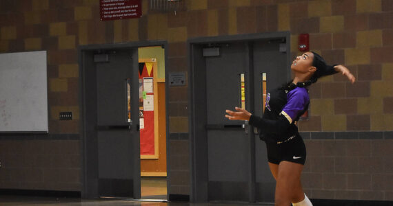 Nicholas Zeller-Singh/Kitsap News Group Photos
Viking Coriana McMillian helps tie the second set with an ace.