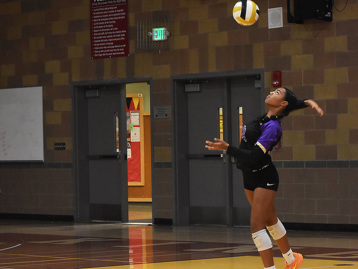 Nicholas Zeller-Singh/Kitsap News Group Photos
Viking Coriana McMillian helps tie the second set with an ace.