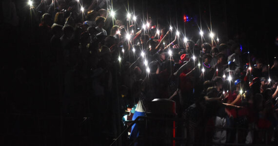 Nicholas Zeller-Singh/Kitsap News Group Photos
North Kitsap students light up their phones during the power outage.