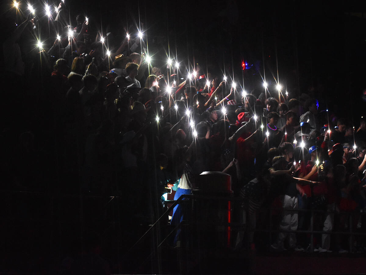 Nicholas Zeller-Singh/Kitsap News Group Photos
North Kitsap students light up their phones during the power outage.