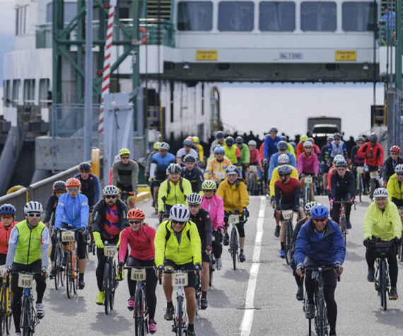 Damon Williams courtesy photos
Bicyclists pour off of the ferry in Kingston to start the ride.