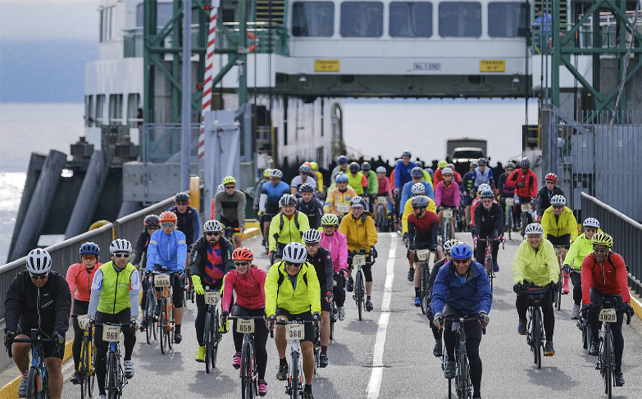 Damon Williams courtesy photos
Bicyclists pour off of the ferry in Kingston to start the ride.