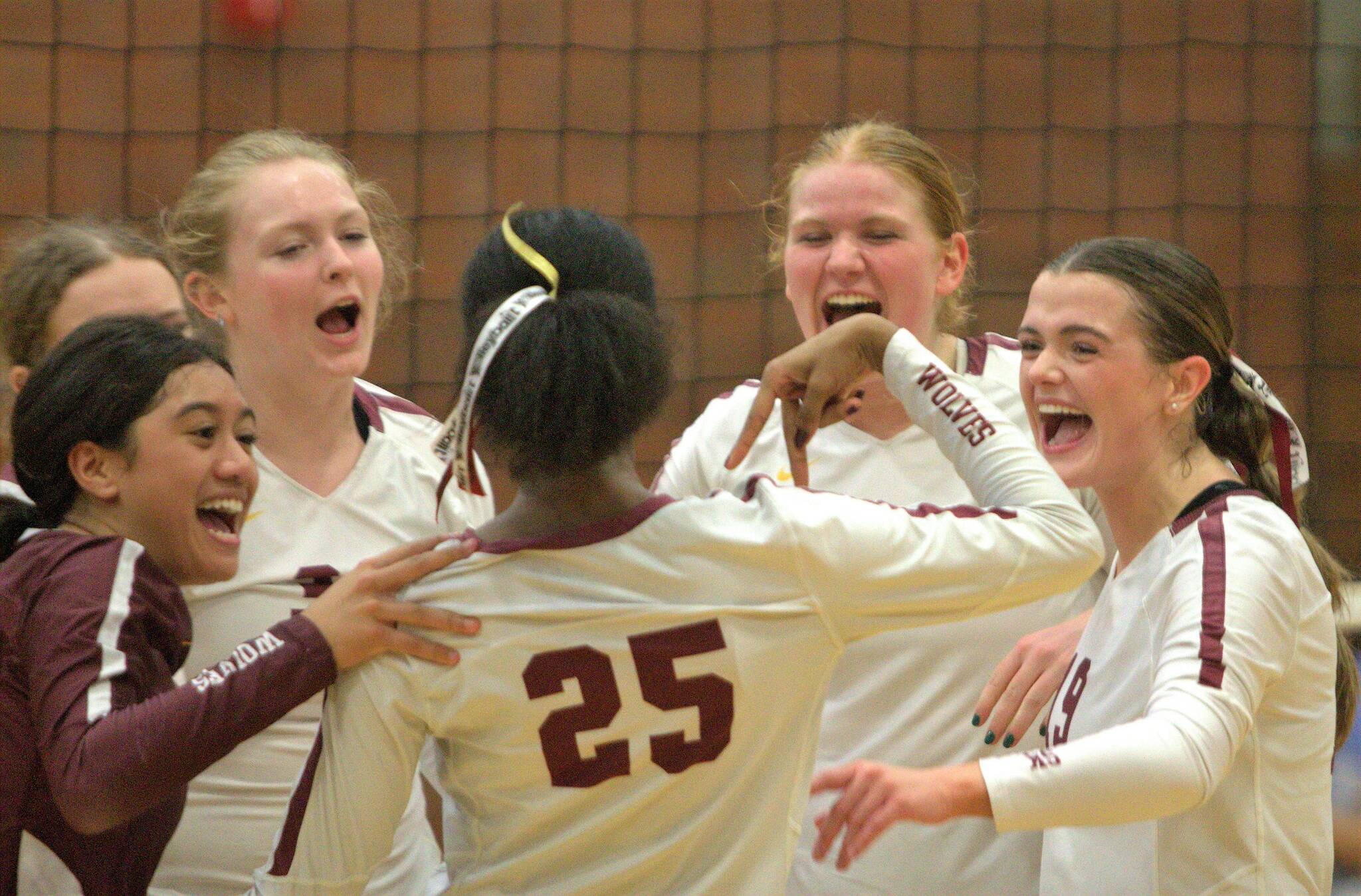 Elisha Meyer/Kitsap News Group
South Kitsap players celebrate after taking another early point in the second set of their Sept. 26 match versus Curtis.