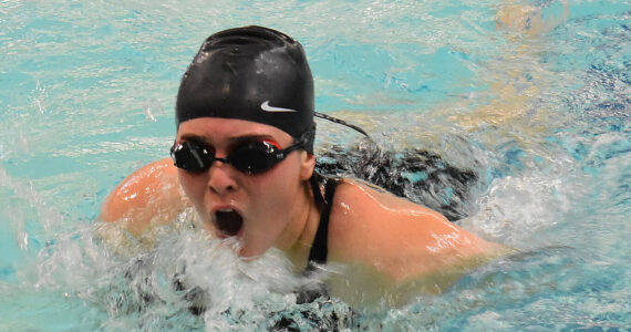 Kingston’s Tegan Stanford competes in the 100-yard freestyle.