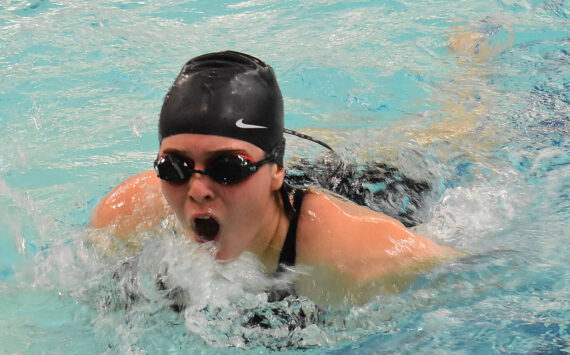 Kingston’s Tegan Stanford competes in the 100-yard freestyle.