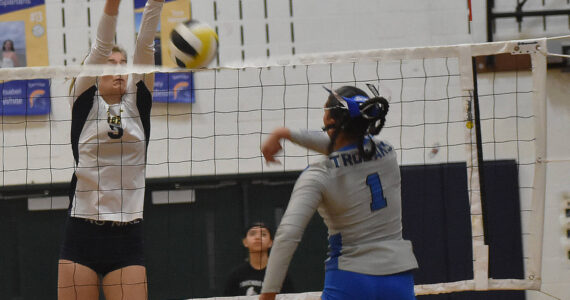 Nicholas Zeller-Singh/Kitsap News Group Photos
Olympic’s Aviyah Blackwell picks up the kill.