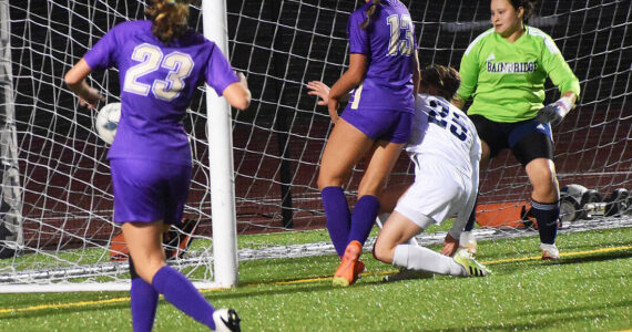 Nicholas Zeller-Singh/Kitsap News Group Photos
North Kitsap’s Syleena Hogan scores two goals against Bainbridge.