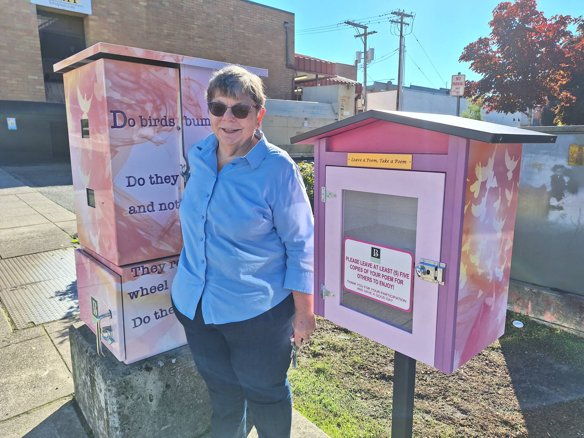 Elisha Meyer/Kitsap News Group
Bremerton poet laureate Tia Hudson returns to the poem box to see what works of art might be waiting for fellow poets.