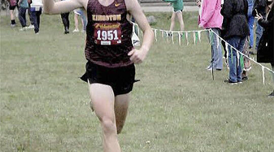Keith Thorpe/Olympic News Group Photos
Lucas Lenz of Kingston shows that he is finishing first as he crosses the finish line at the Olympic League Championships in Port Angeles Oct. 19.