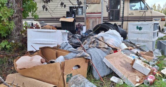 Elisha Meyer/Kitsap News Group Photos
Litter piles up next to a broken trailer in the Bravo Terrace encampment.