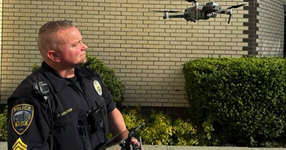 Mike De Felice/Kitsap News Group Photos
Sgt. Trey Holden launches one of the crime-fighting drones, which can go places officers can’t because of the danger involved.