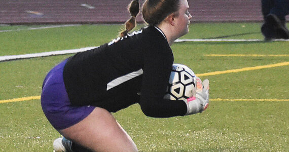 Nicholas Zeller-Singh/Kitsap News Group Photos
Goalie Campbell Weible makes a diving save for the Vikings.