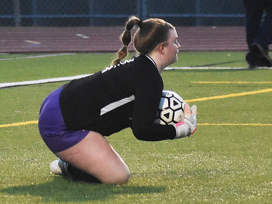 Nicholas Zeller-Singh/Kitsap News Group Photos
Goalie Campbell Weible makes a diving save for the Vikings.