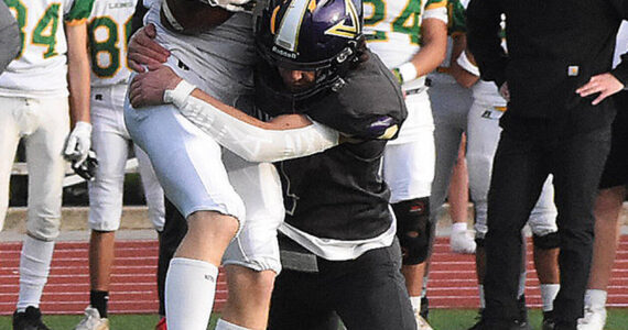 Nicholas Zeller-Singh/Kitsap News Group Photos
Viking Alex Hitchings gave up a catch on this play but later made the game-winning interception against Lynden.