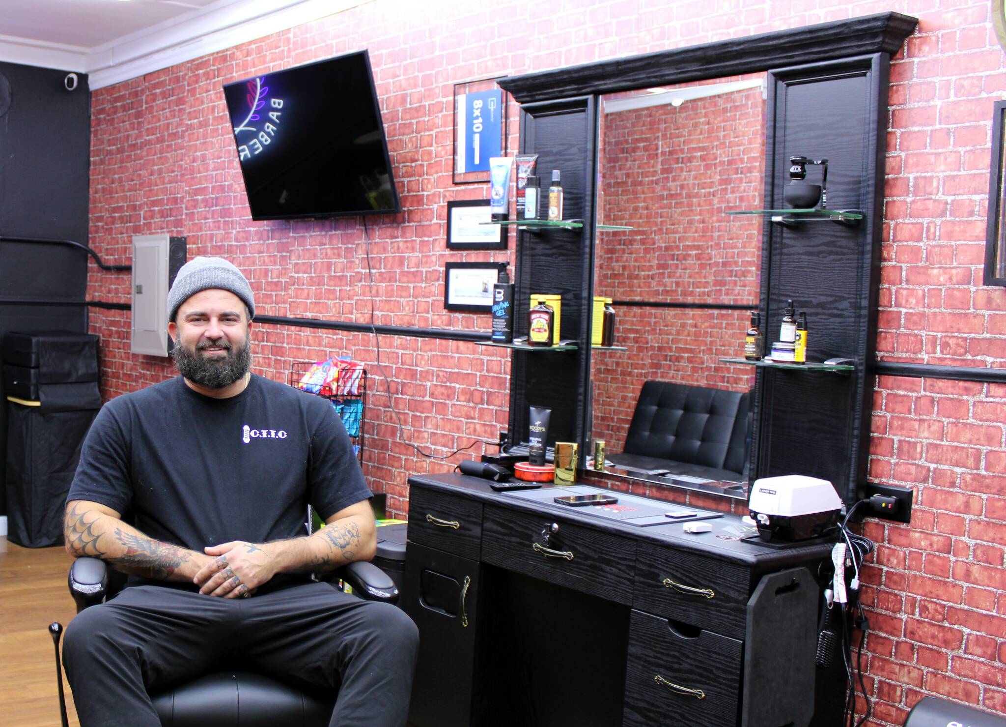 Elisha Meyer/Kitsap News Group
Chase Austin shows off the inside of his new Cut to the Chase barbershop, a place where he hopes to bring the community together through haircuts.
