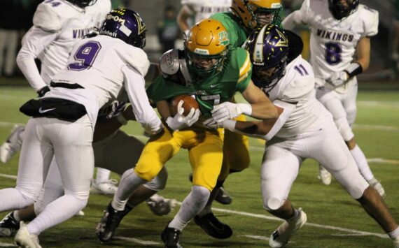 Elisha Meyer/Kitsap News Group
Seniors Kaden Pickard and Ben Gomez team up to bring down a Thunderbird runner.