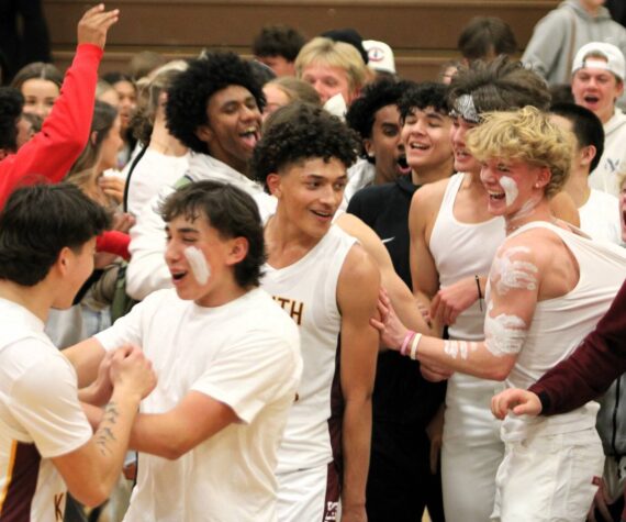 Elisha Meyer/Kitsap News Group Photos
Senior Kenny Miller smiles as the South Kitsap students celebrate on the court.