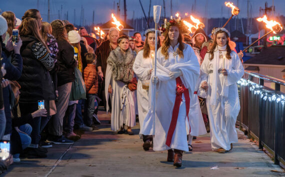 Damon Williams/Kitsap News Group Photos
The Lucia Bride’s procession during Julefest in downtown Poulsbo Dec. 2.