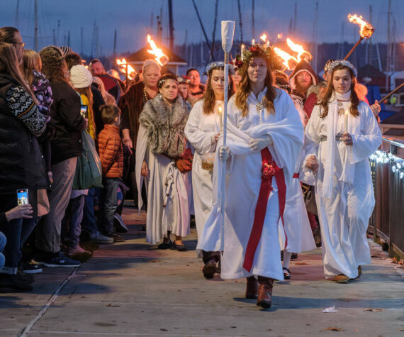Damon Williams/Kitsap News Group Photos
The Lucia Bride’s procession during Julefest in downtown Poulsbo Dec. 2.